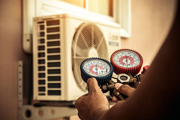 Professional Air Conditioning Service technician working in Irving, TX
